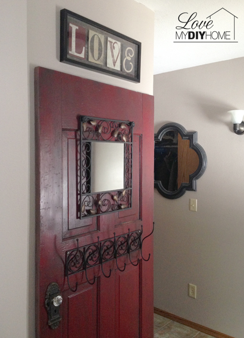 Take an old, antique door and turn it into something fabulous! Door Turned Hall tree {Love My DIY Home}