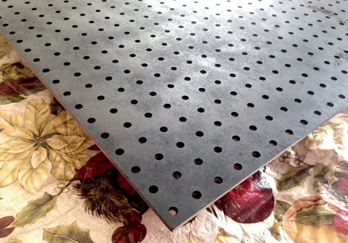 Primer pegboard before painting {LoveMyDIY Home}
